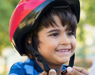 Image of a boy wearing a helmet
